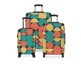 Set di valigie da viaggio grandi, medie e piccole. Bagaglio a mano con rotelle, design retrò a blocchi di colore astratti