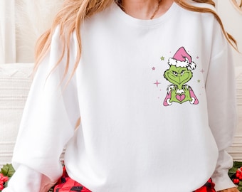 Sudadera navideña del Grinch - Rosa festiva, cuello redondo - Algodón suave, tallas unisex S-XXL, prenda cómoda para las fiestas
