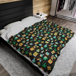 May include: A black and white duvet cover with a repeating pattern of green marijuana leaves, orange pills, and blue vials. The pattern is on a black background.