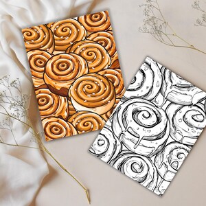 K&ouml;nnte beinhalten: Zwei illustrierte Karten mit Zimtschnecken. Eine Karte zeigt eine farbenfrohe Illustration von goldbraunen Zimtschnecken mit wei&szlig;em Zuckerguss und Streuseln. Die andere Karte zeigt eine Schwarz-Wei&szlig;-Strichzeichnung derselben s&uuml;&szlig;en Leckerei.