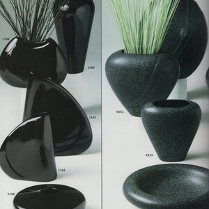 May include: Two sets of black and green ceramic vases. The black vases are glossy and the green vases have a speckled finish. The vases are arranged in a grid pattern with product numbers listed below each vase.