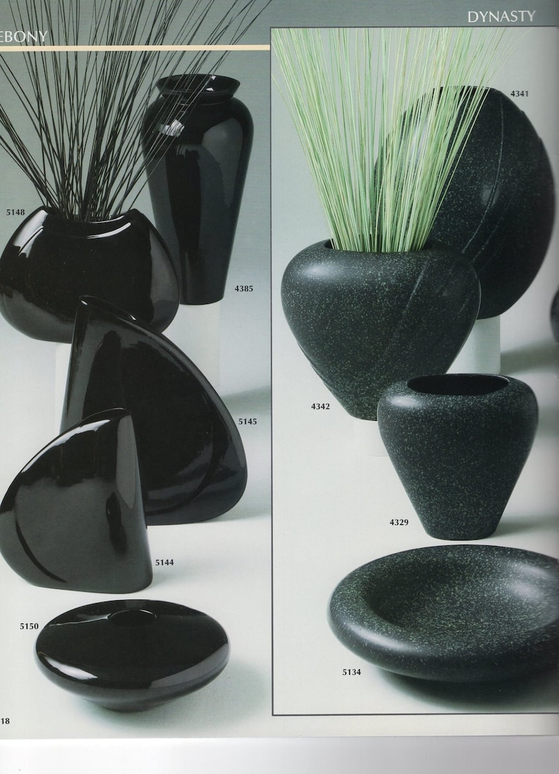 May include: Two sets of black and green ceramic vases. The black vases are glossy and the green vases have a speckled finish. The vases are arranged in a grid pattern with product numbers listed below each vase.