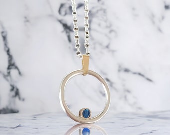 Handmade Silver and Yellow 9ct Gold Blue Sapphire Circle Pendant, blue sapphire, sapphire jewellery, circle necklace, boho chic jewellery