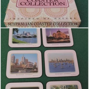 May include: A collection of coasters depicting scenes of Melbourne, Australia. The coasters have a pink border and are packaged in a box with the text "Australian Coaster Collection" and "Inspired by Nature".