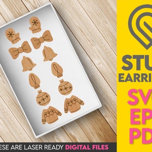 May include: Wooden stud earrings in various holiday shapes, including mittens, bows, bells, light bulbs, ornaments, and sweaters. The earrings are displayed in a white box on a wooden surface. Text on the right says "STUD EARRINGS SVG EPS PDF".