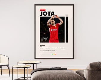 May include: Framed poster featuring Diogo Jota, a Portuguese footballer. The poster has a black frame and a white background with the name "JOTA" in large black letters. The image shows Jota in a red jersey, with his arms raised.