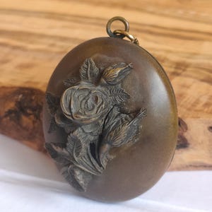 Antique Victorian Vulcanite Mourning Locket – Carved Rose Design, c.1860s–80s