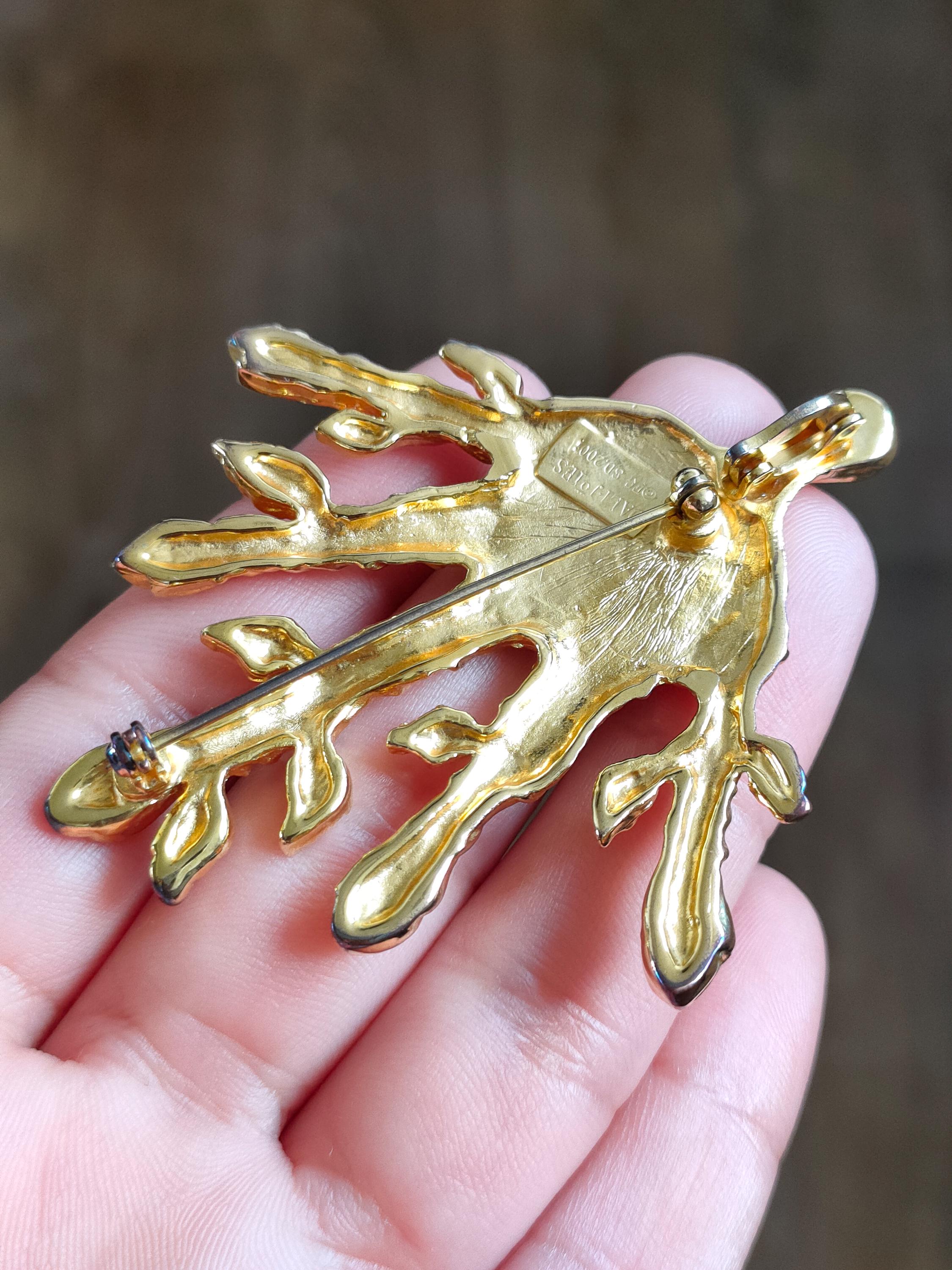 Dali brooch discount