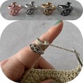 Yarn tension ring  for knitting or crochet- adjustable - yarn guide, crochet ring, tension helper Peacock product logo