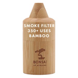 May include: A cylindrical bamboo smoke filter with a tapered top. The text SMOKE FILTER 350+ USES BAMBOO is printed in white. A dark brown logo of a bonsai tree is visible above the text BONSAI BY AYRLUNE on the light brown wood grain surface.