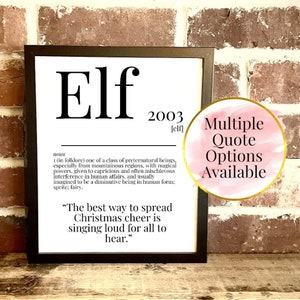 May include: A black framed print with a white background and black text defining the word "Elf" as a noun. The definition is in a smaller font size. The year 2003 is printed in a larger font size. The text "Multiple Quote Options Available" is printed in a pink circle with a white outline. The quote "The best way to spread Christmas cheer is singing loud for all to hear." is printed in black text.