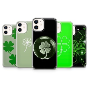 May include: Five different iPhone cases with a four-leaf clover design. The cases are clear, black, green, and have a glitter design.