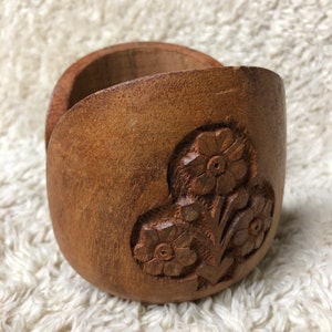 Vintage folk art wooden hand carved flowers on candle holder