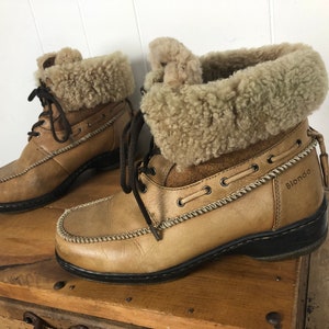 Sheepskin and leather lace up warm and cozy winter boots size US 8