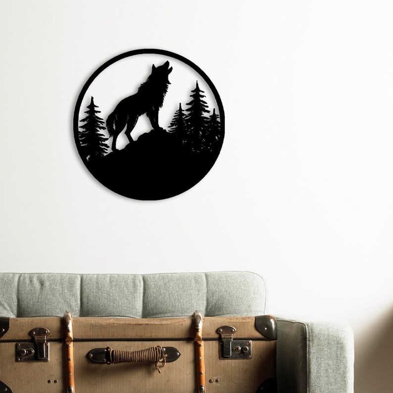 May include: Black metal wall art featuring a wolf howling at the moon with a silhouette of trees in the background.