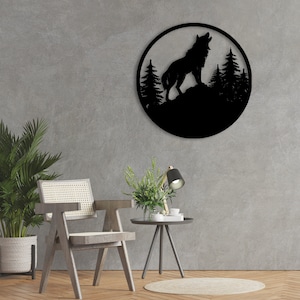 May include: Black metal wall art featuring a wolf howling at the moon with a forest silhouette in the background.