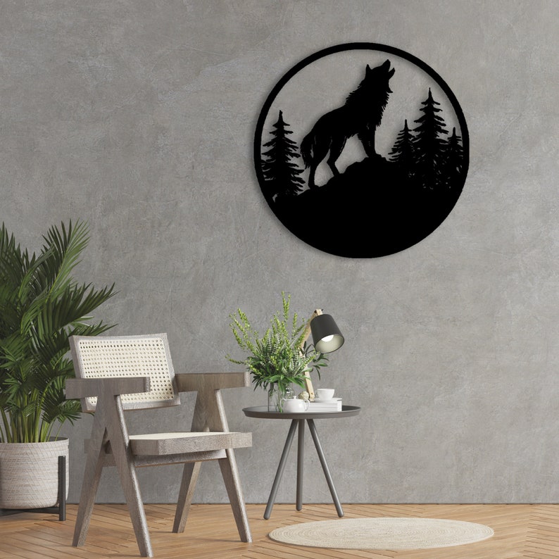 May include: Black metal wall art featuring a wolf howling at the moon with a forest silhouette in the background.