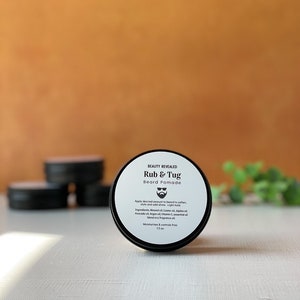 Luxurious beard pomade with mango butter and Jamaican black castor oil for a soft, strong, and glowing beard. 2 oz.