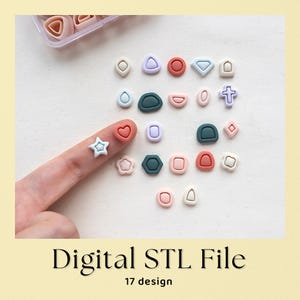 May include: A collection of small, multi-colored geometric and symbolic shapes including hearts, stars, crosses, and circles. These items are arranged in a grid pattern, featuring pastel and muted tones like pink, blue, green, and lavender. Digital STL File 17 design.