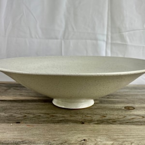 Large speckled white ceramic bowl