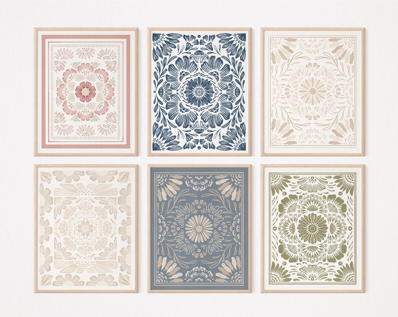 May include: Set of six framed prints featuring intricate floral patterns in shades of pink, blue, green, and beige. The prints have a vintage, hand-drawn aesthetic and would add a touch of bohemian charm to any room.