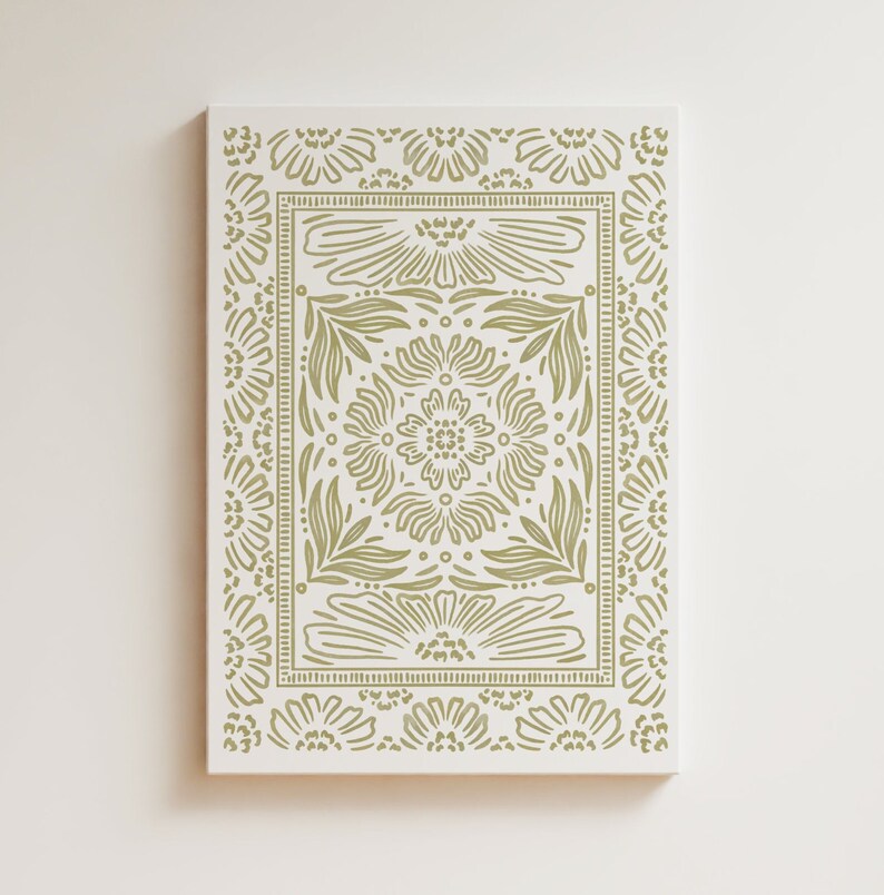 May include: A green and white floral pattern on a canvas print. The pattern is symmetrical and features a repeating design of flowers and leaves.