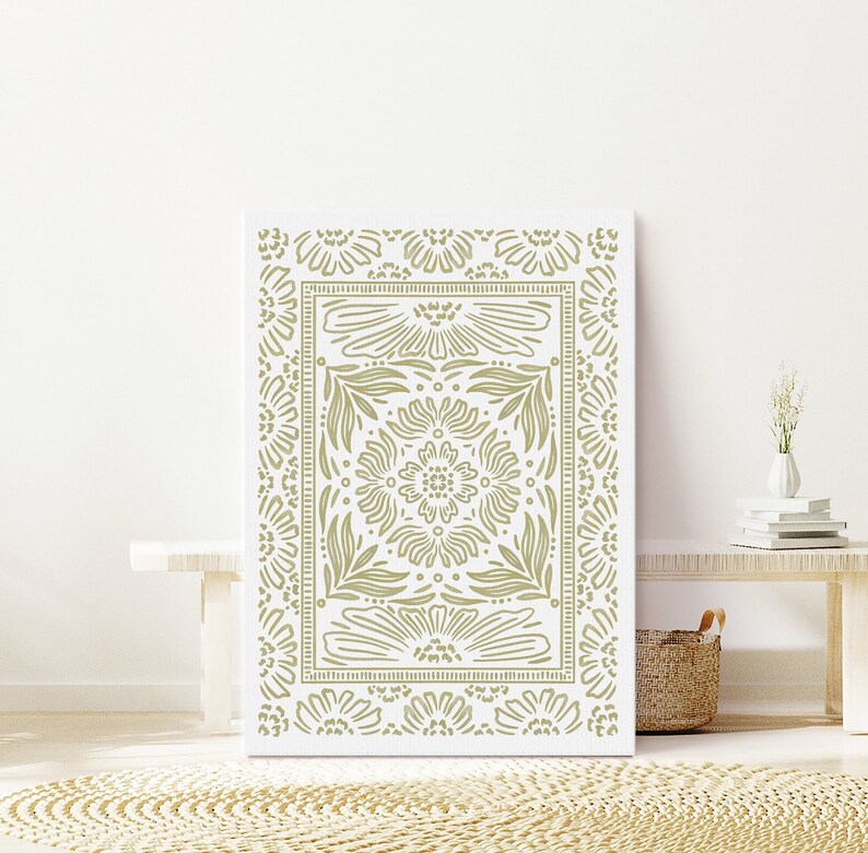 May include: A white canvas print with a green floral pattern. The pattern is symmetrical and features a repeating design of flowers and leaves.