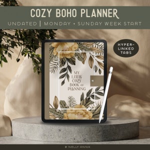 May include: A digital planner with a floral design on a tablet screen. The planner is titled "My Little Cozy Book of Planning" and features hyper-linked tabs. The tablet is on a gray stone surface.