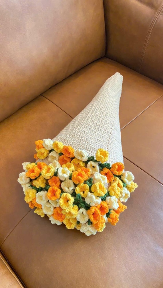 完成したかぎ針編みの花束ブランケット - ブランケットを折って