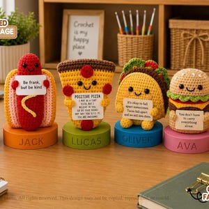 May include: Six crocheted food figures including fries, a hot dog, pizza, a taco, a burger, and a burrito, each holding a white card with text. They stand on individual colored wooden bases engraved with the names James, Jack, Lucas, Oliver, Ava, and Emma.