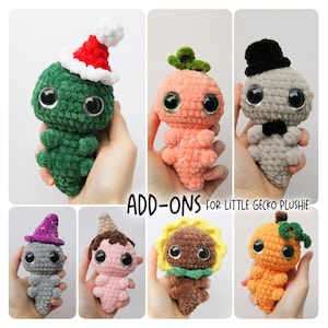 May include: Crocheted plush gecko toys with various add-ons, including a Santa hat, a carrot top, a top hat, a witch hat, an ice cream cone, a sunflower, and a pumpkin.
