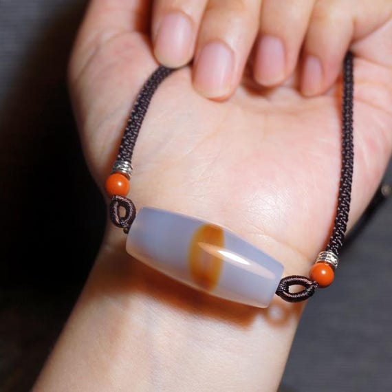 Natural orange sheep eye high ice type ice-transparent bead, Dzi pendant, silk agate, Brazilian material barrel bead, Buddhist bead.