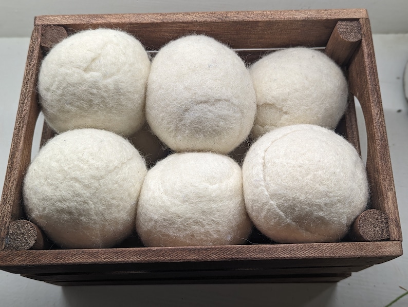 Hand made dryer balls. Be clear this is a single dryer balls image 1