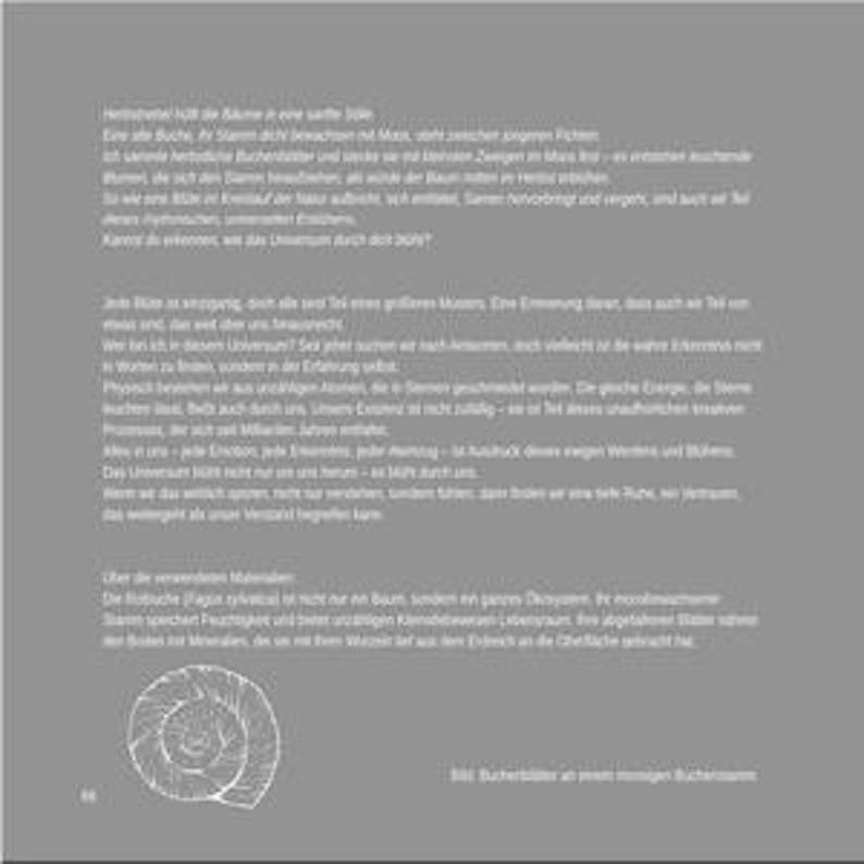 May include: A gray page with German text and a white illustration of a spiral. The text is in a serif font and is centered on the page. The illustration is in the lower left corner.