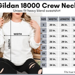 May include: A white Gildan 18000 crew neck unisex fit heavy blend sweatshirt. The image includes a size chart with measurements in inches for width, length, and sleeve length, ranging from size small to 5X. (1 inch = 2.54 cm)