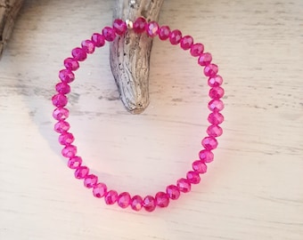 Bracelet with faceted glass beads, strung on elastic band, neon pink, handmade
