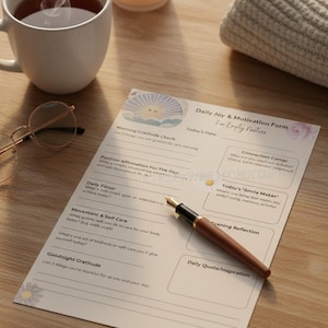 May include: A daily joy and motivation form for empty nesters, with a pen, a cup of tea, a candle, and a pair of glasses on a wooden surface. The form includes sections for gratitude, affirmations, and daily focus.