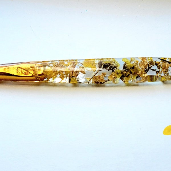 Beautiful yellow real dried flowers in Resin Crochet Hook with gold flakes