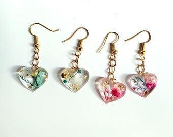 Handmade resin earrings with tiny flowers and gold leaf inside