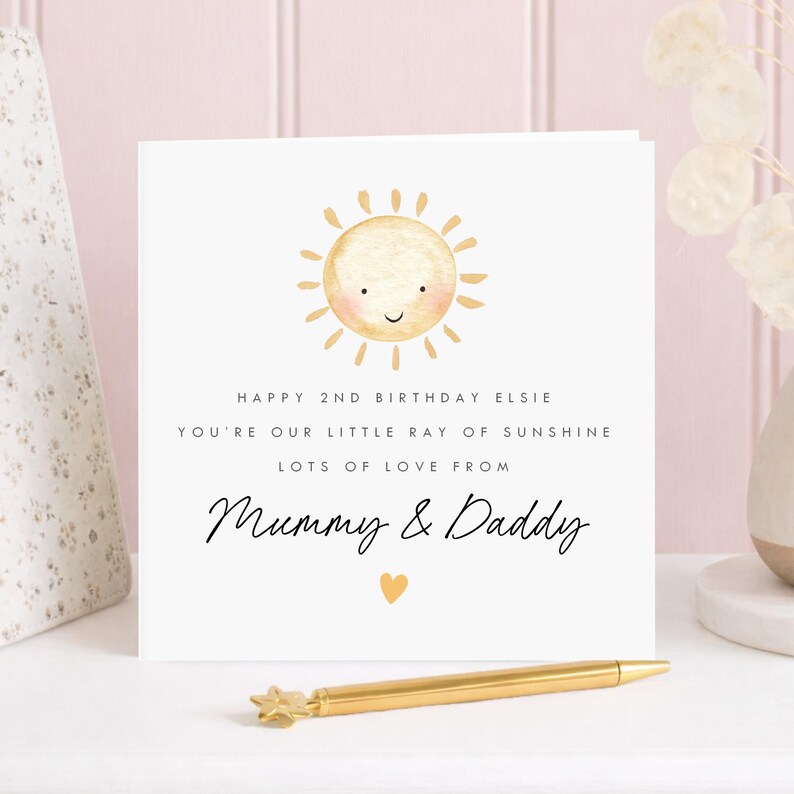 Personalised 2nd birthday card for a girl with cute smiling watercolour sun and little ray of sunshine message, personalised with her name and sender names, a sweet second birthday card for a daughter, granddaughter or special little girl.