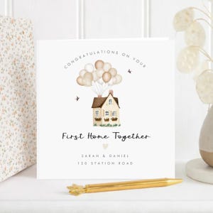 Celebrate a special move with this personalised new home card featuring a cute pink version of the Disney Up house. A thoughtful housewarming greeting card perfect for congratulating friends, family, or new homeowners on their first home together. This beautiful keepsake card can be customised with names and address details, creating a meaningful reminder of a brand new chapter.
