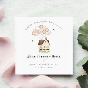 Celebrate a special move with this personalised new home card featuring a cute pink version of the Disney Up house. A thoughtful housewarming greeting card perfect for congratulating friends, family, or new homeowners on their first home together. This beautiful keepsake card can be customised with names and address details, creating a meaningful reminder of a brand new chapter.