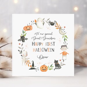Personalised first Halloween card for baby featuring cute illustrations of pumpkin, ghost, spider, bat, mummy, black cat, and Frankenstein character in autumn colours. Includes custom relation and name with the message ‘Happy First Halloween' Perfect keepsake card for son, daughter, grandson, granddaughter, niece, or nephew celebrating their first spooky season. Printed on quality 300gsm lightly textured cardstock, measures 148 x 148mm and is supplied with a blank recycled kraft envelope.