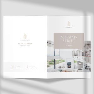 May include: A real estate brochure with a minimalist design featuring a photo of a modern home interior with a fireplace and large windows. The brochure includes the address "768 Main Street" and the text "Real Estate" and "Emily Thompson, Real Estate Agent".