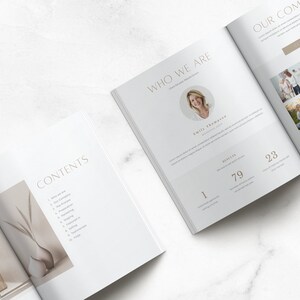 May include: A magazine open to a page titled "Who We Are" with a headshot of Emily Thompson, a woman with brown hair and a white shirt. The page also includes the text "Our Company" and numbers "1", "79", and "23".