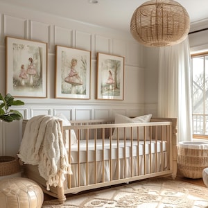 May include: A nursery with a light wood crib, a woven pendant light, and three framed watercolor prints of fairies. A woven basket and a potted plant are also visible. The room has a neutral color palette with white walls and a beige rug.
