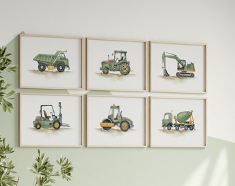 May include: Set of six framed prints featuring watercolor illustrations of different construction vehicles. The vehicles are all green with yellow accents and are depicted on a white background. The frames are a light wood color.
