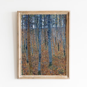 May include: A framed painting of a forest scene with tall, slender trees in shades of blue and green. The ground is covered in a layer of fallen leaves in shades of brown, yellow, and orange.