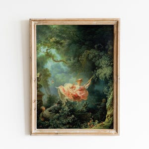 May include: A framed oil painting depicting a woman in a pink dress swinging on a rope swing in a lush green forest. The woman is surrounded by trees and foliage, and there are other figures in the background.
