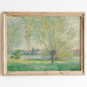 Puede incluir: Una pintura enmarcada que representa una escena de paisaje con un río, árboles y casas en la distancia. La pintura está realizada en un estilo ligero e impresionista con tonos de verde, azul y amarillo.